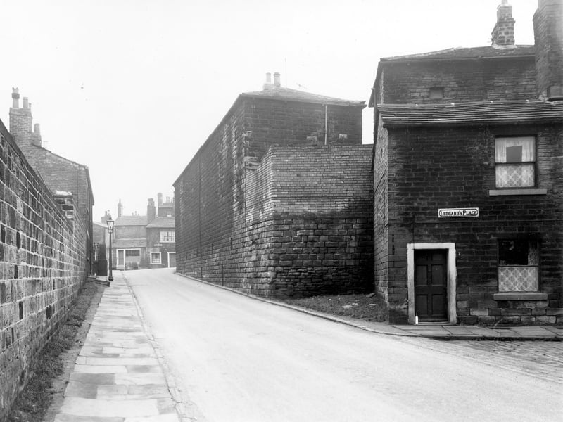 A view down Eyres Mill Side towards Theaker Lane in November 1957. On the right is a blind back terrace number 1 Ledgard's Place, probably named after the legendary local figure Samuel Ledgard. Ledgard took over the Nelson Hotel pub from his father in the late 1890s.