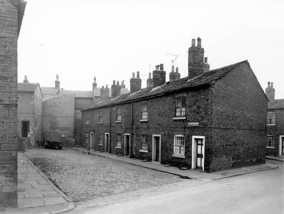 A row of five back-to-back terraced houses on Ledgard's Place pictured in November 1957.