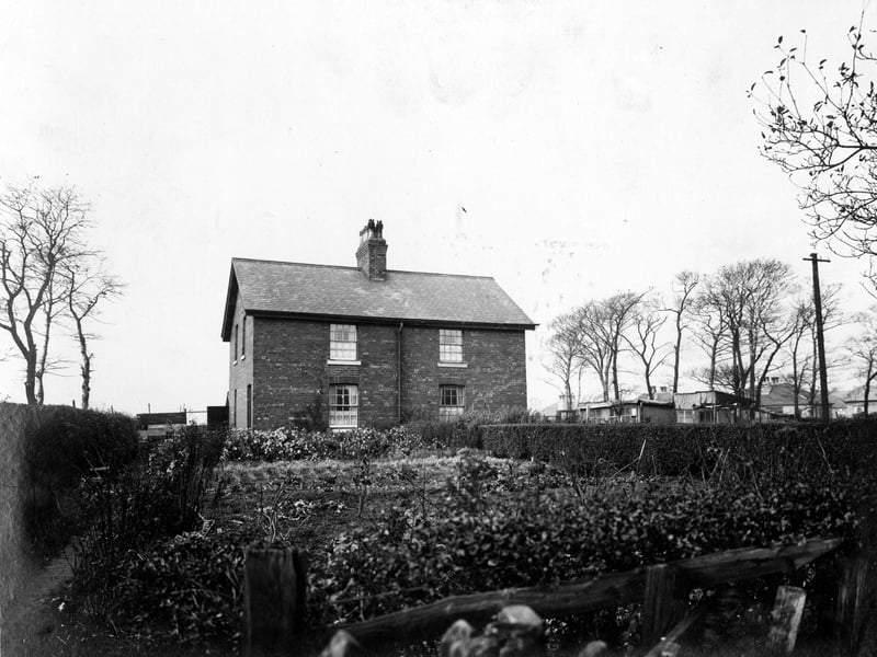 Harehills Park Cottages looking south. They are known locally as Park House and Park Cottage and are located in Harehills Park adjacent to one of the bowling greens. Pictured in November 1934.