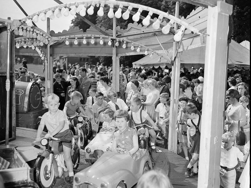 Youngsters enjoy a ride on the roundabout at the Davidson's Mains Gala Day in June 1959.