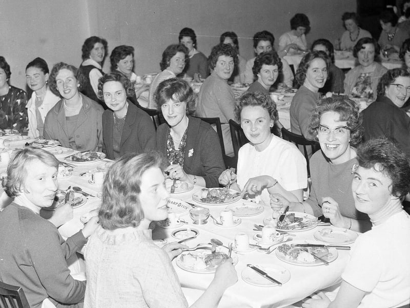 The Young Wives Club of Davidson's Mains Parish Church hold their Annual Dinner in the Wee Windaes in November 1964.