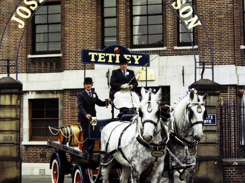 Shire horses and carriage pictured outside Tetley's Brewery.