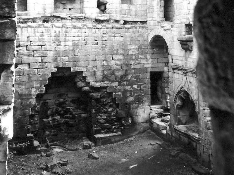 Inside Harewood Castle, a 14th century fortified manor house off the west side of Harrogate Road. It shows the great hall which measures approx. 16.5 metres by 9 metres. There is a large fireplace set into the south wall and the room above is the solar.