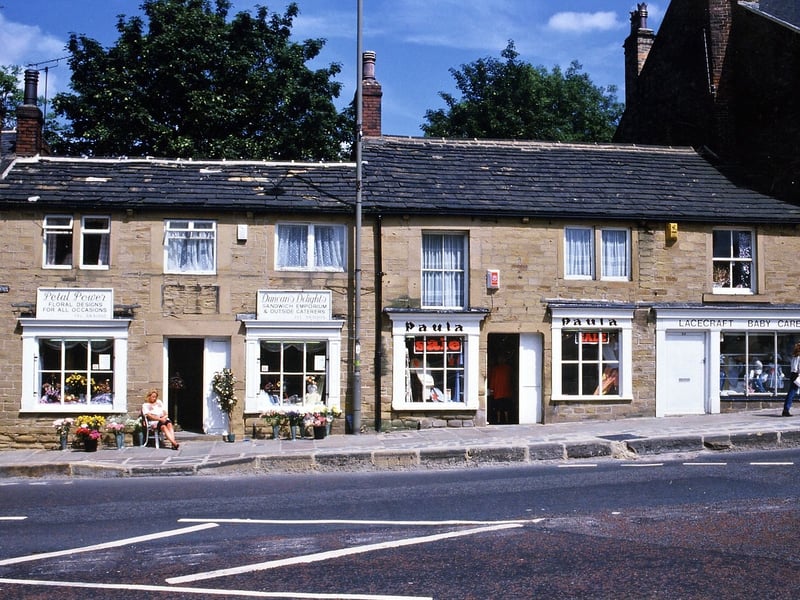 Queen Street in July 1994. Shops at the time of the photo are Petal Power Floral Designs, Duncans Delights Sandwich Emporium, Paula Ladies Fashion and Lacecraft Babycare.
