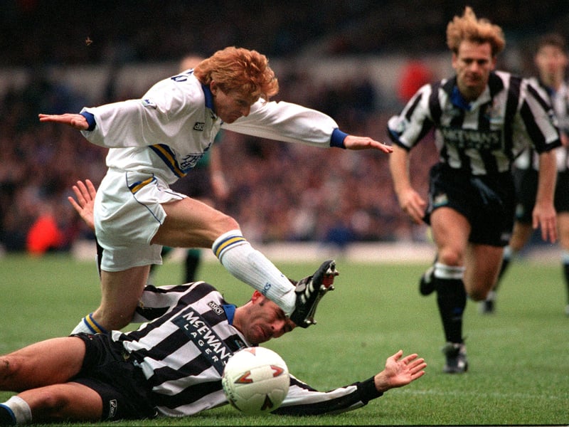  Gordon Strachan strides over Steve Howey during the Premier League clash against Newcastle United at Elland Road on Boxing Day in December 1994. The game ended goalless.