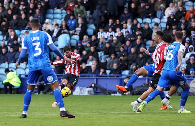 Tom Cannon scores United's third goal during the Sky Bet Championship match against Sheffield Wednesday at Hillsborough on November 23, 2025. (Photo by George Wood/Getty Images)