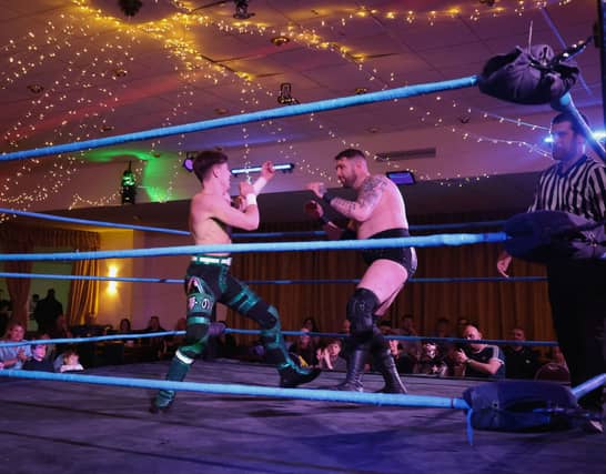 A Gosport Royal Navy base was transformed into a wrestling arena, with personnel, veterans, and families, being treated to a night of action.
