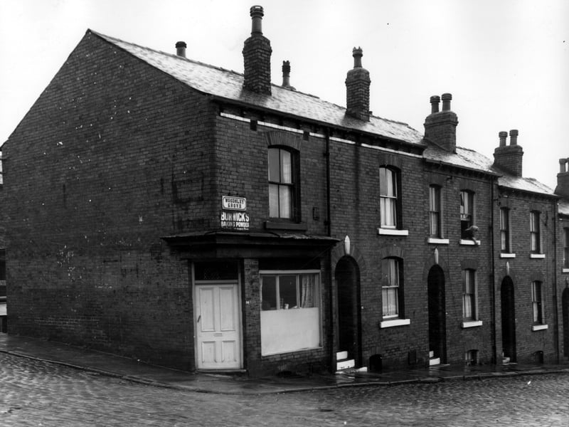 Looking from the corner of Osborne View to Woodsley Grove in November 1963. Number 34 on the left was previously a shop there is a sign on the wall which had advertised 'Borwick's Baking Powder'. Moving right are 32, 30 (a woman is leaning from the window washing the sill) then 28 at the right side.