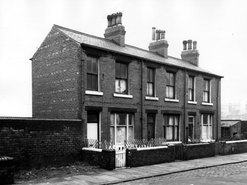 Three houses on Woodsley View, number 39 on the left is empty, 41 is in the centre and 43 to the right. An unusual feature of these houses was a garage which was built underneath. Access was from the back. Pictured in November 1963.