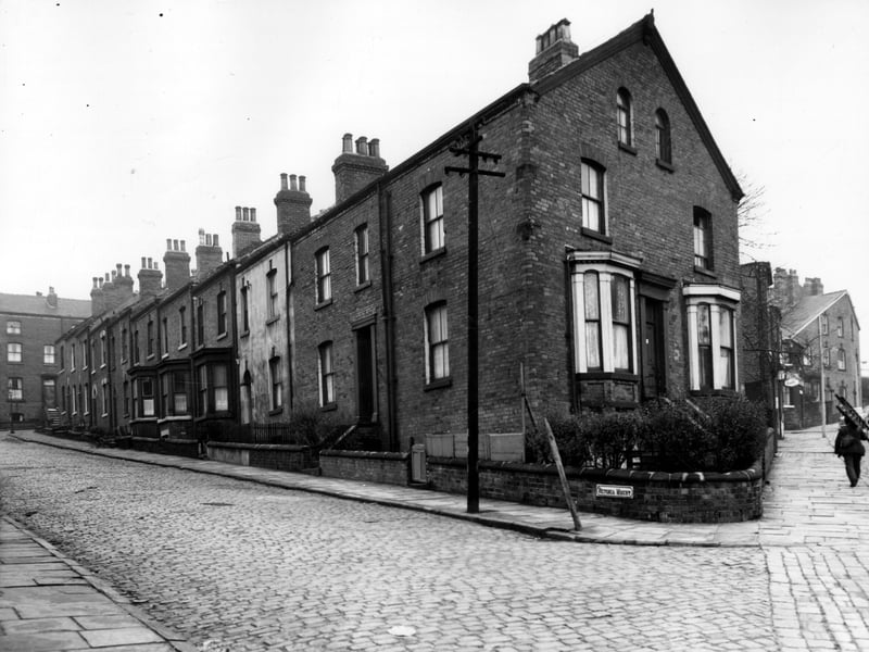 Looking along Victoria Mount, the even numbered side, in November 1963. On the left Osborne View can be seen, Victoria Mount numbering ends here with 20. On the right, the large house at the end is number 2. Facing onto Woodsley Road are two bay windows, the entrance door and right window are 57 Woodsley Road.