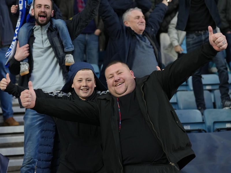 Two very happy Pompey fans at the final whistle