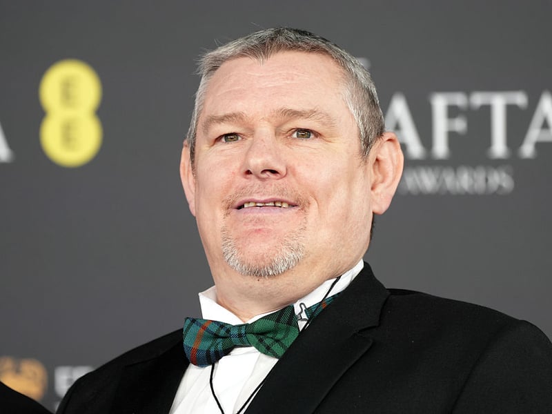 John Davidson from Galashiels, upon whose life the BAFTA-winning film 'I Swear' was based, arrives at The Royal Festival Hall.
