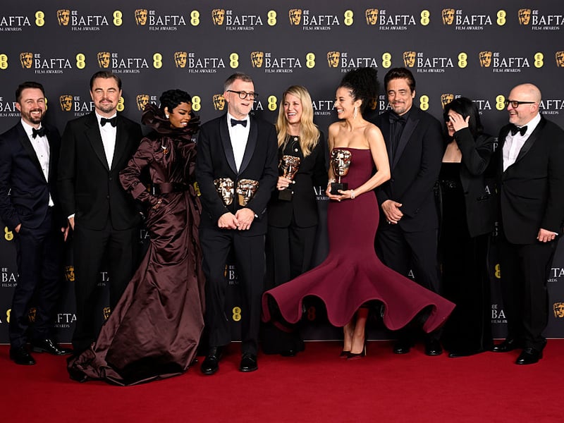 Best Director and Best Film winner Paul Thomas Anderson with the cast of 'One Battle After Another' - the biggest winner on the night.
