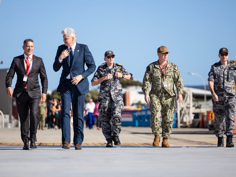 (L-R) Hon. Paul Papalia CSC, MLA, Minister for Defence Industries and Minister for Veterans, Sir Stephen Lovegrove, GCMG KCB Prime Ministers Special Representative for AUKUS, Commanding Officer of HMAS Stirling, CAPT Ken Burleigh, RAN, Admiral William Houston, Director, Naval Nuclear Propulsion, Department of Navy/Department of Energy and VADM Jonathan Mead AO RAN, Director General Australian Submarine Agency (ASA) at HMAS Sirling for the arrival of HMS Anson.