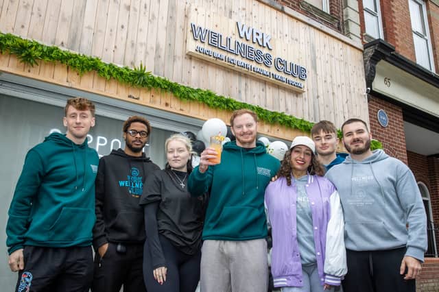 WRK Wellness Club owners Harley Elliott & Anika Billing with their staff.