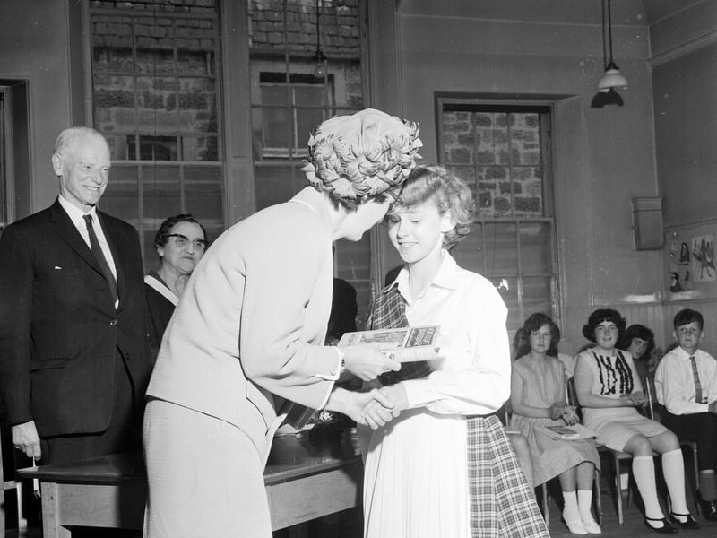 Dux Girl Allison Blacklaws receives her prize at the Liberton Primary School end of term prizegiving in June 1965.