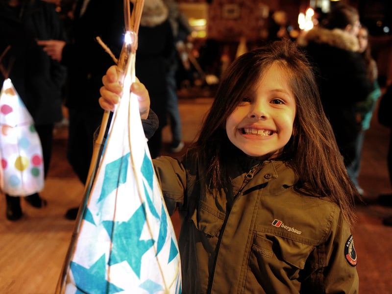 Miles Buckham, 7, is proud of his lantern.