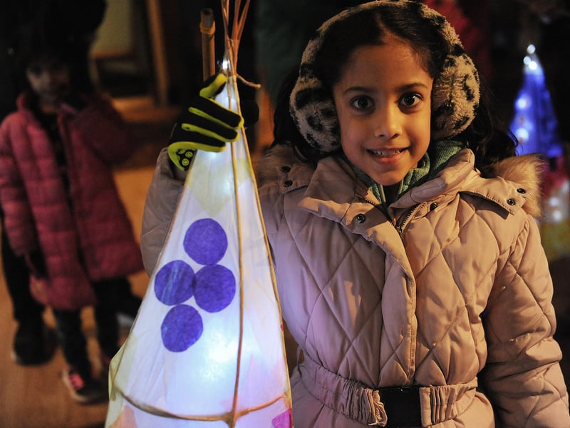 Emily Fernandes, 8, with her lantern at the parade.