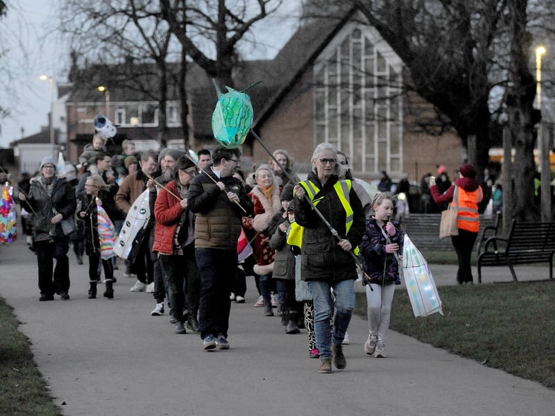Organiser Helen Lucy leads the parade through Manston Park.