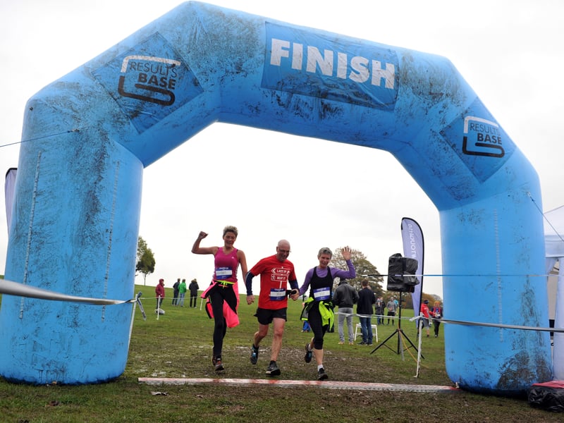 Runners tackle the Cancer Research UK Tough 10km through Roundhay Park in November 2016.
