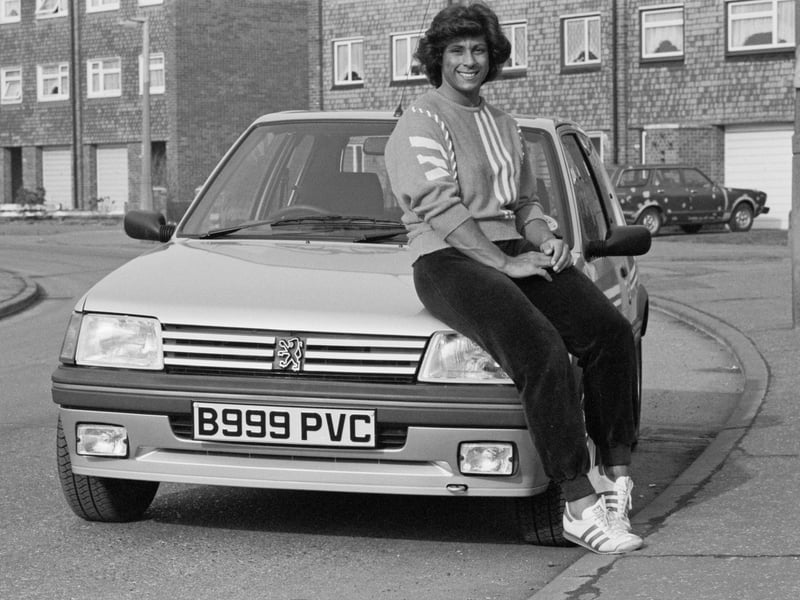 The Peugeot 205 had many fans during the 80s, including the Olympic javelin star Fatima Whitbread, pictured here with one in 1985. One person called it a 'fantastic' car, while another said it was 'stupidly fast for the time'.