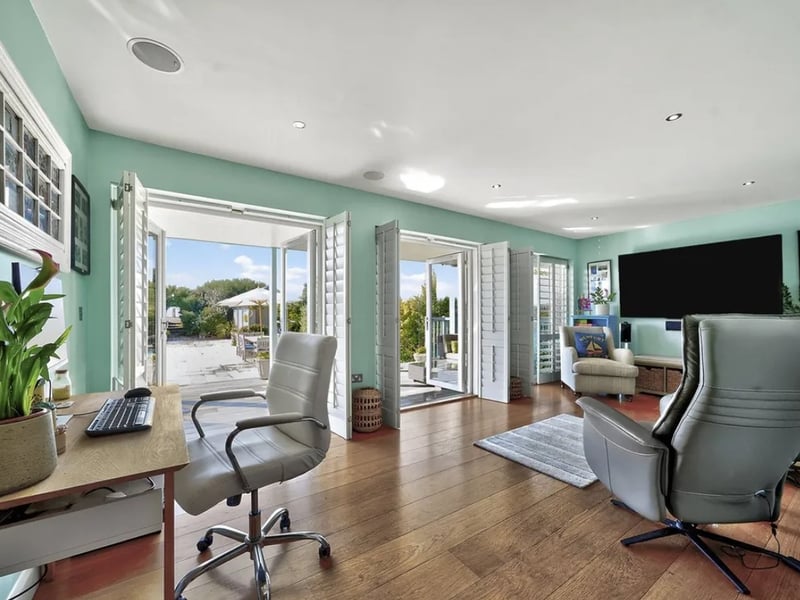 This five bedroom beach house comes with panoramic Solent views and direct access to the sea from a private deck.