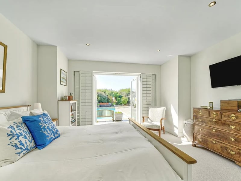 This five bedroom beach house comes with panoramic Solent views and direct access to the sea from a private deck.