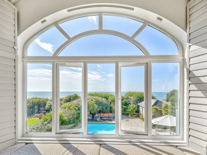 This five bedroom beach house comes with panoramic Solent views and direct access to the sea from a private deck.