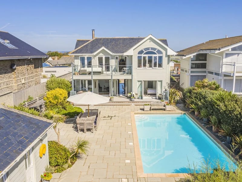 This five bedroom beach house comes with panoramic Solent views and direct access to the sea from a private deck.