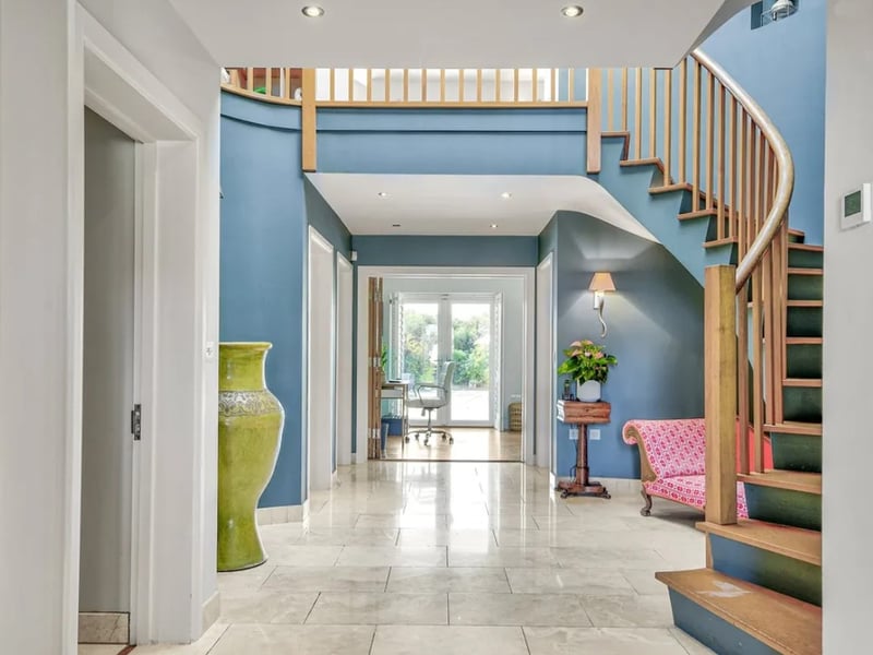 This five bedroom beach house comes with panoramic Solent views and direct access to the sea from a private deck.