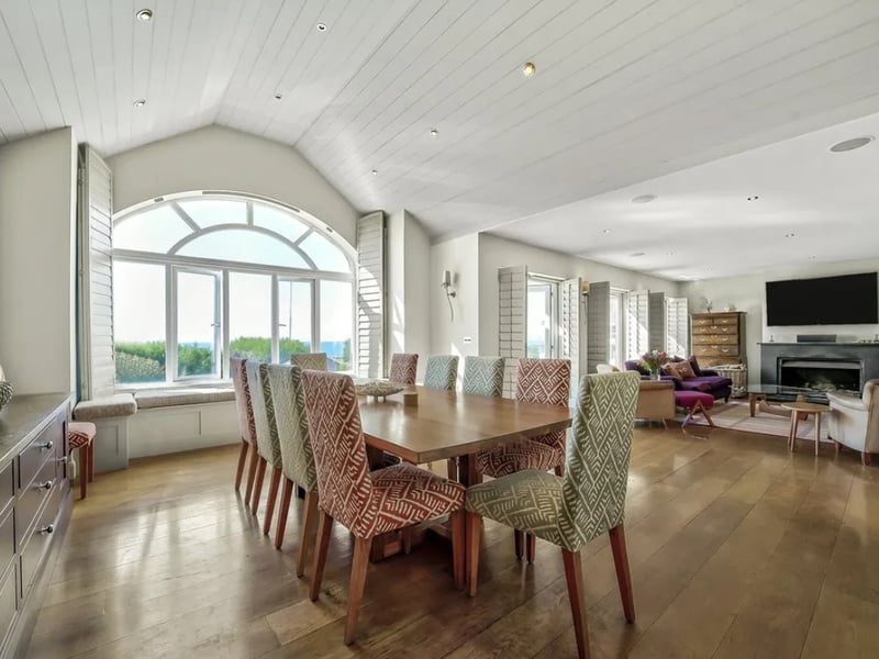 This five bedroom beach house comes with panoramic Solent views and direct access to the sea from a private deck.