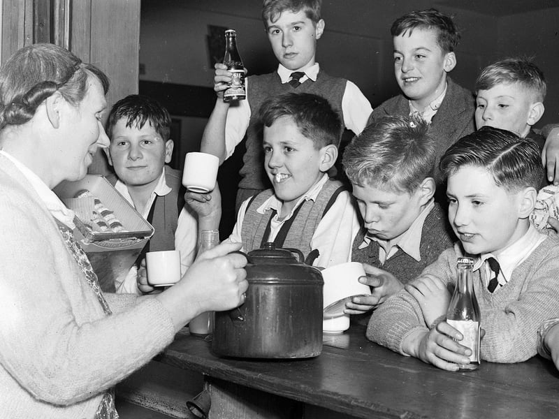 Mrs Aitchison serving up tea at Craigmillar Boys Club in December 1955.