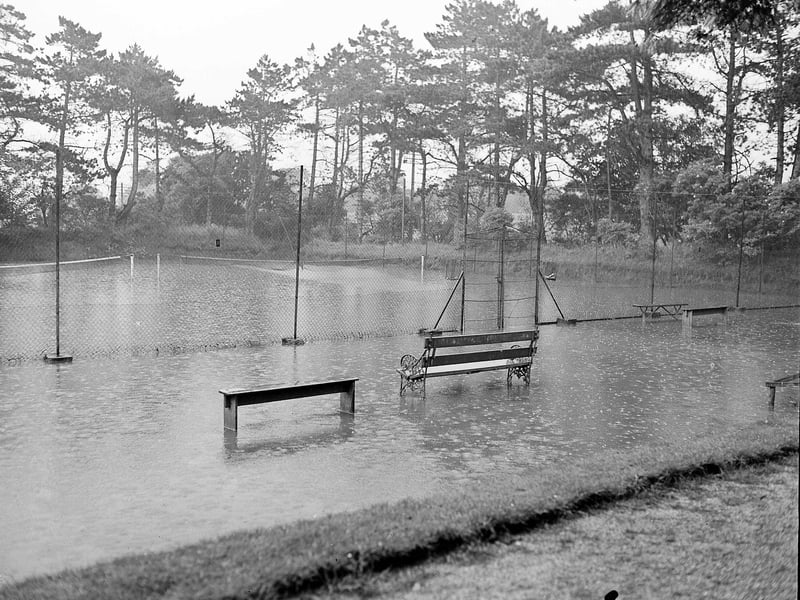 Flooding at Craigmillar Tennis Court in July 1958.