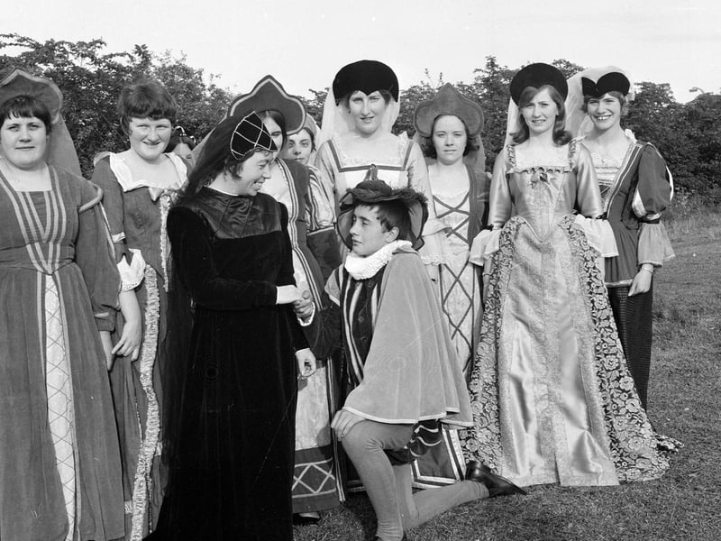Three girls dressed in ladies in waiting costumes at the Craigmillar Pageant at Craigmillar Castle in June 1967.