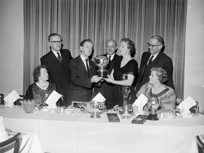  Mr J Leadbetter receives a trophy at the Craigmillar Bowling Club dinner in November 1963,