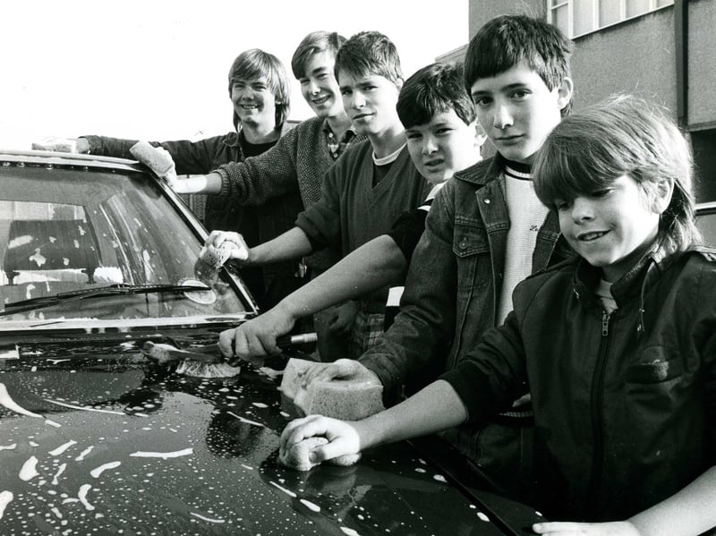Glenrothes Boys Brigade get stuck into a charity car wash at the Baptist church in October 1986