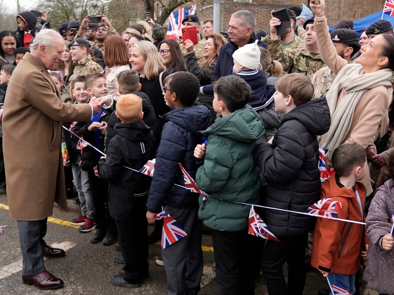 King Charles III meets with serving personnel and their families during a visit to the Royal Regiment of Artillery at Baker Barracks, Thorney Island