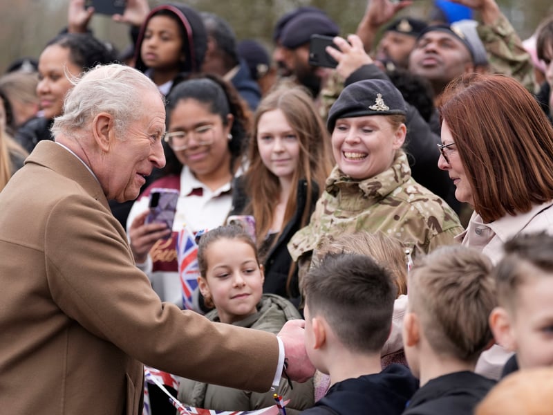 King Charles III meets with serving personnel and their families during a visit to the Royal Regiment of Artillery at Baker Barracks, Thorney Island