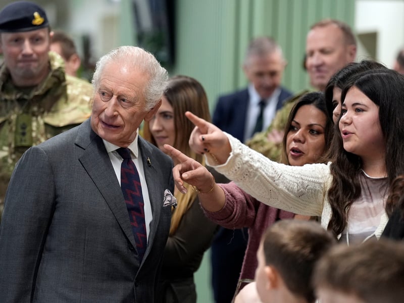 King Charles III meets with families of personnel serving abroad during a visit to the Royal Regiment of Artillery at Baker Barracks, Thorney Island