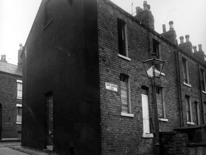On the left of the photo from November 1969 is the Back Hanover Avenue, gable end entrance to number 11 Hanover View. On the right can be seen Back Hanover View, here are the rear entrances and yards of through terraced houses on Hanover View.
