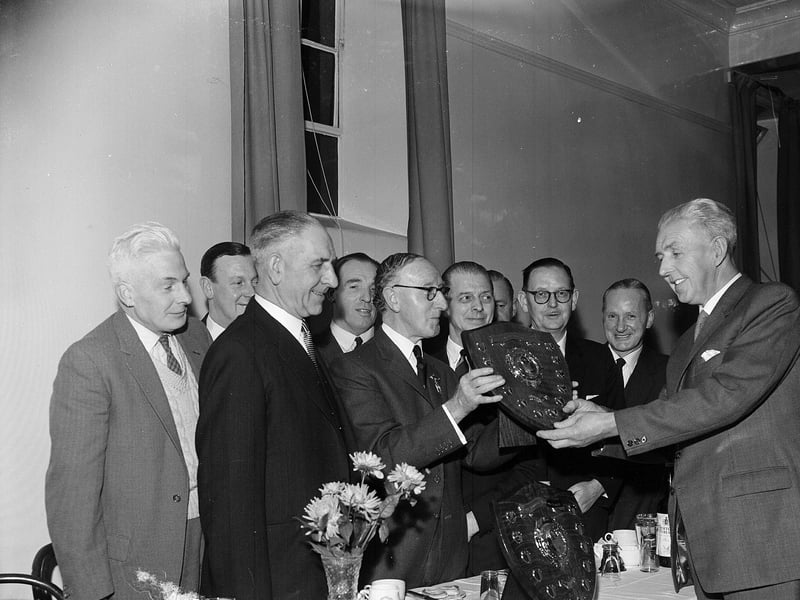 President Mr J Hutchinson receives a shield at the East Edinburgh Bowling League presentation of prizes at Craigentinny Bowling Club in October 1962.