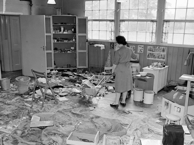 Janitor Mrs K Thorburn surveys the damage done by vandals to Craigentinny Nursery School in October 1961.
