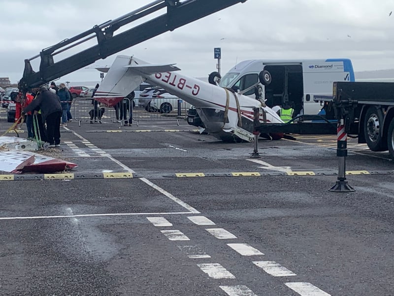 Light aircraft being salvaged in Lee-on-the-Solent car park. Picture by Steve Bone