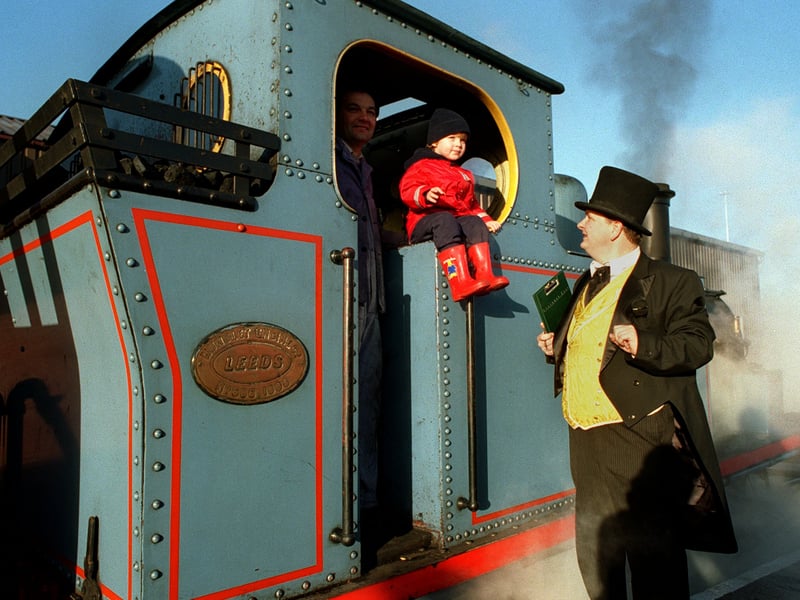 Two year old Edward Ellis, from Robin Hood, with the Fat Controller on the foot plate of Middleton Railway's Thomas the Tank Engine. Pictured in December 1997.