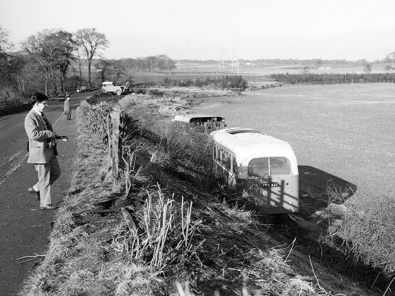 A bus which had plunged down a 20 foot drop in Currie in March 1963.