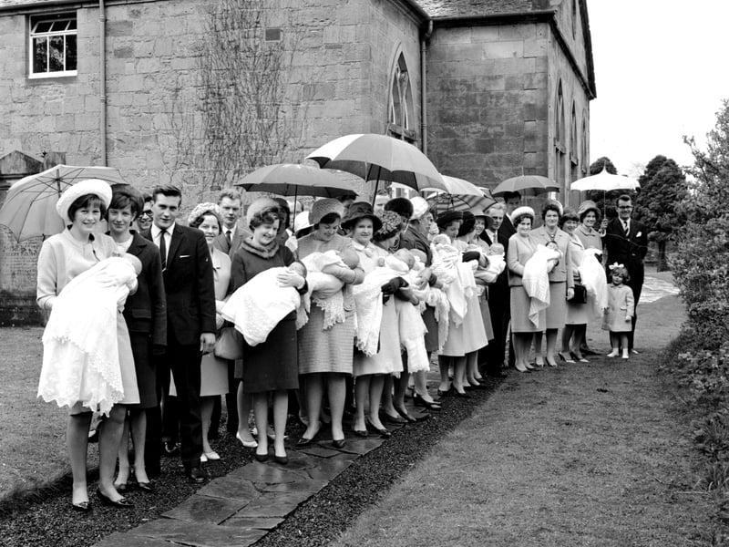 Ten christenings being held at Currie Kirk in May 1966.