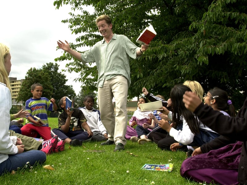 Pupils enjoying a summer literacy class with performance poet Paul Cookson in August 2000.