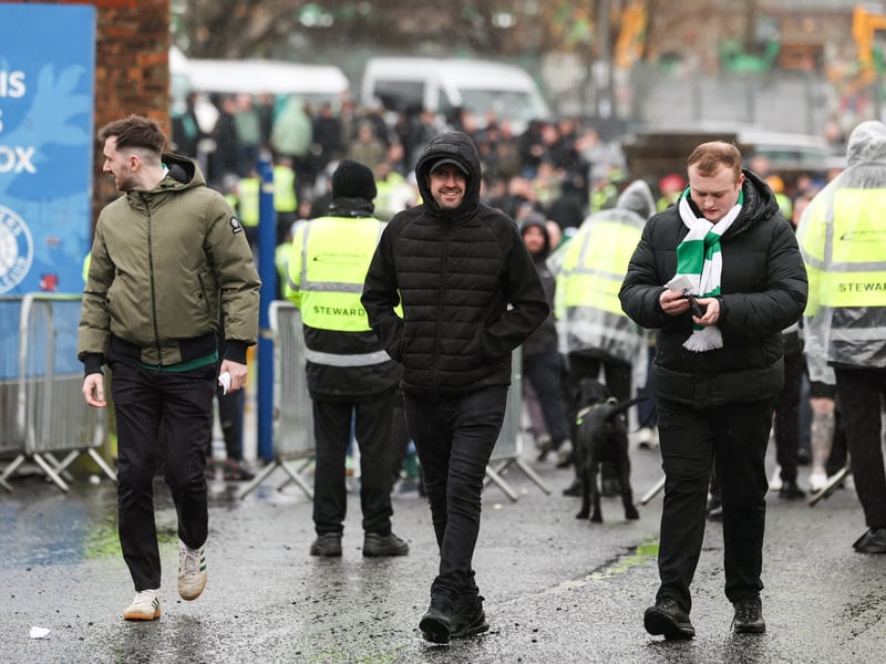  Celtic fans arrive at the ground before the game.