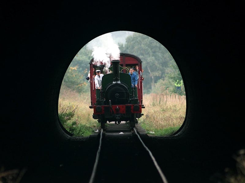 The Miracle steam engine at Middleton Light Railway approaches a tunnel in September 1997.
