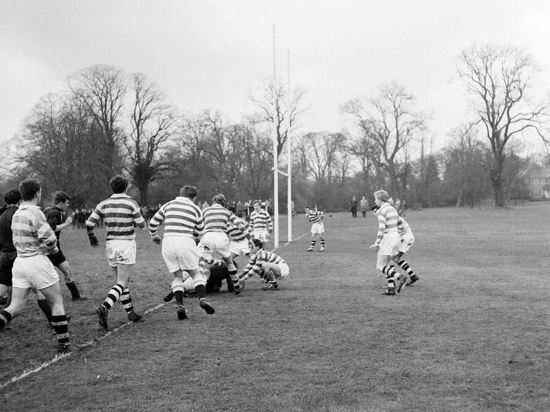 W Laidlaw scores his team's second try in the Merchiston Castle versus Mill Hill rugby match at Colinton in December 1964.
